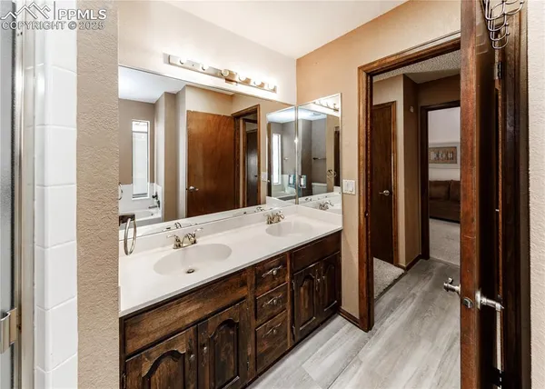 a spacious bathroom with a bathtub and toilet