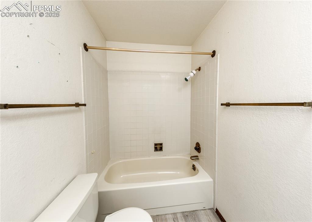 55 Bonnymede Road, Unit S Pueblo, CO 81001 - Photo 24 of 24 a bathroom with a bathtub and a shower