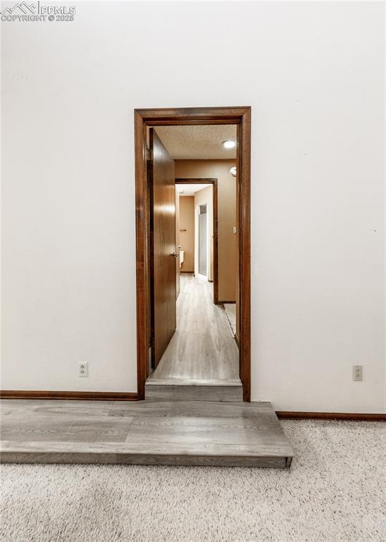 55 Bonnymede Road, Unit S Pueblo, CO 81001 - Photo 9 of 24 a white house with a mirror