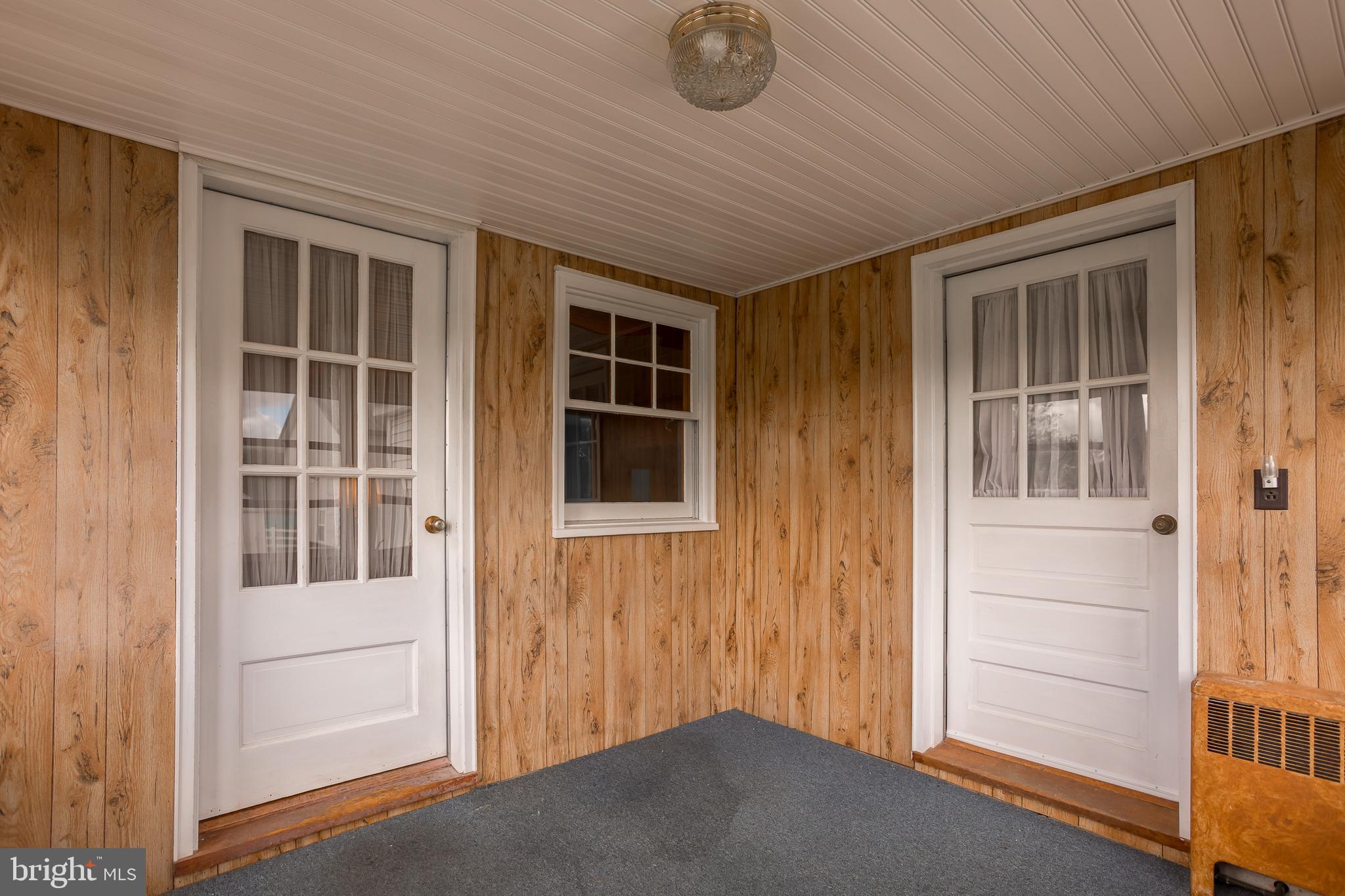 7751 Dividing Creek Road Pocomoke City, MD 21851 - Photo 28 of 51 a view of front door