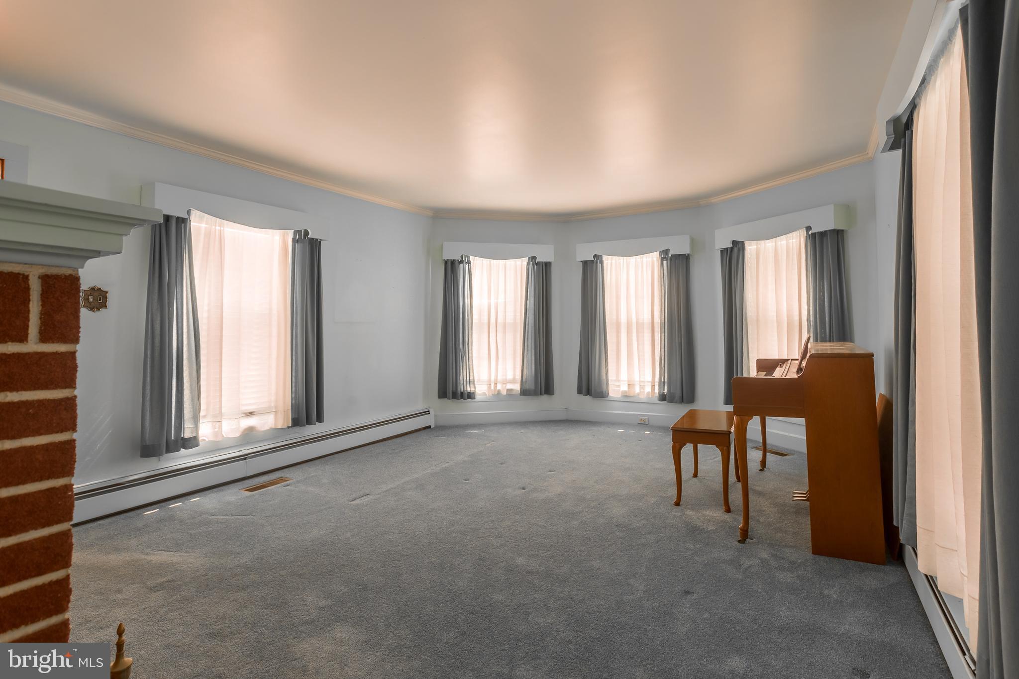 7751 Dividing Creek Road Pocomoke City, MD 21851 - Photo 39 of 51 a view of an empty room with a window