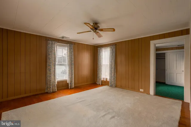 a view of a livingroom with white walls