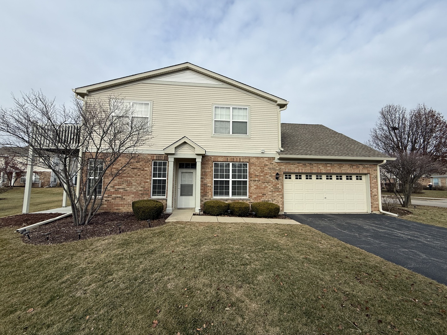 1586 Millbrook Drive Algonquin, IL 60102 - Photo 1 of 18 a view of a house with a yard