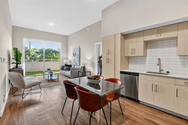 a kitchen with granite countertop lots of counter top space and dining table