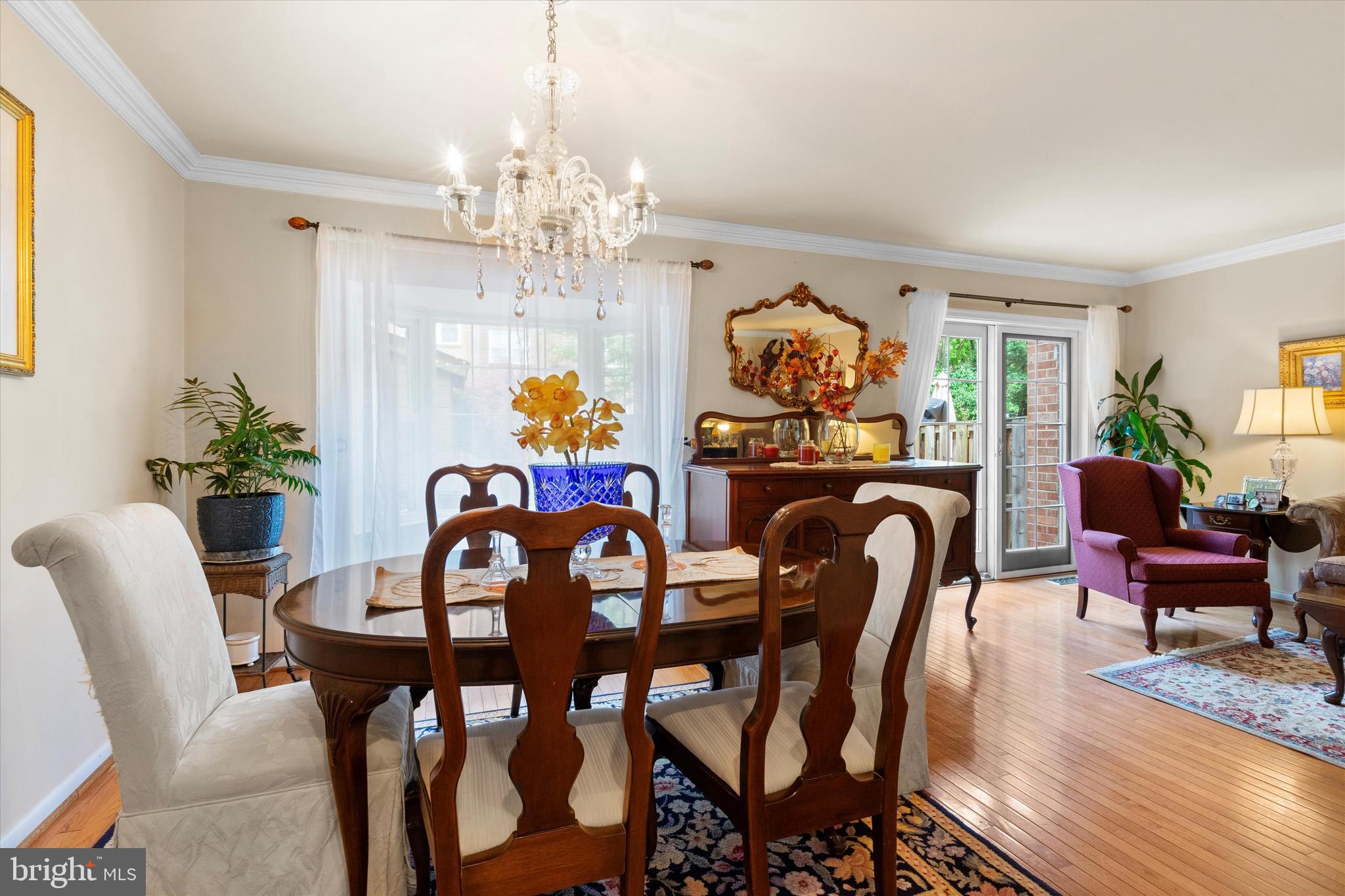 5504 Winford Court Fairfax, VA 22032 - Photo 20 of 61 a view of a dining room with furniture wooden floor and chandelier