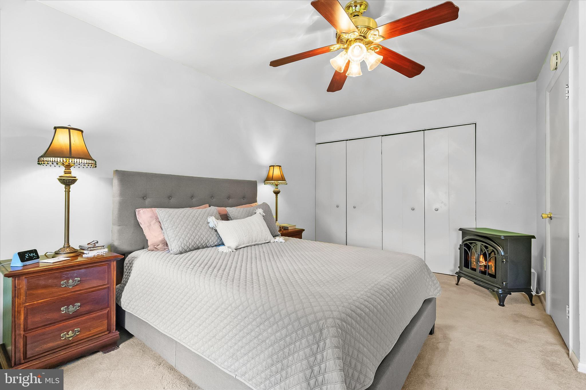 5504 Winford Court Fairfax, VA 22032 - Photo 25 of 61 a bedroom with a bed and a chandelier