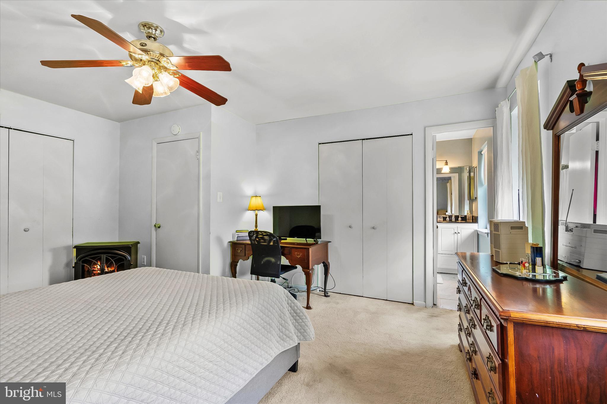 5504 Winford Court Fairfax, VA 22032 - Photo 26 of 61 a bedroom with a bed and a chandelier