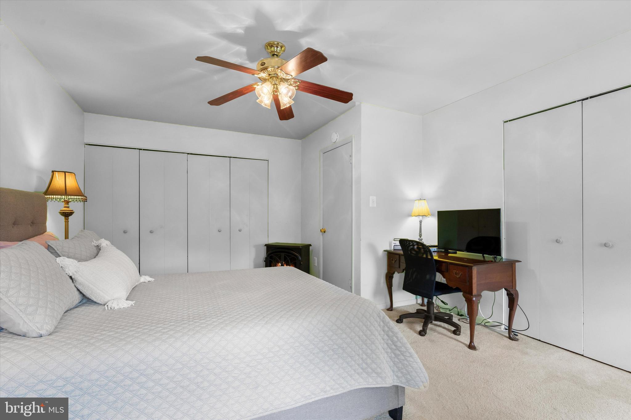 5504 Winford Court Fairfax, VA 22032 - Photo 28 of 61 a bedroom with a bed and a chandelier