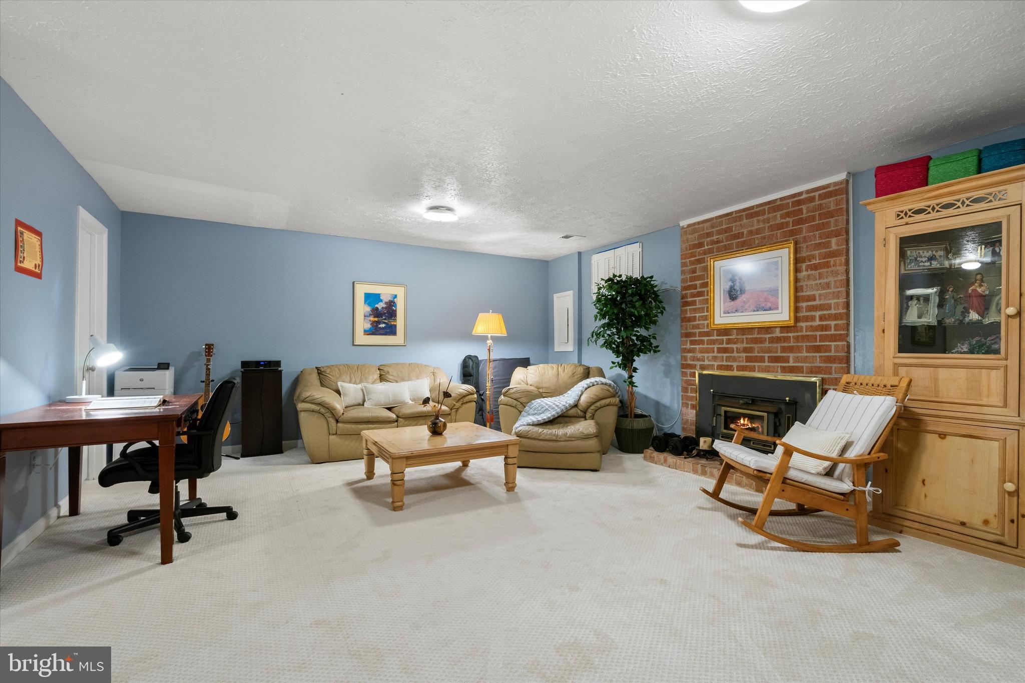 5504 Winford Court Fairfax, VA 22032 - Photo 35 of 61 a living room with furniture and a fireplace