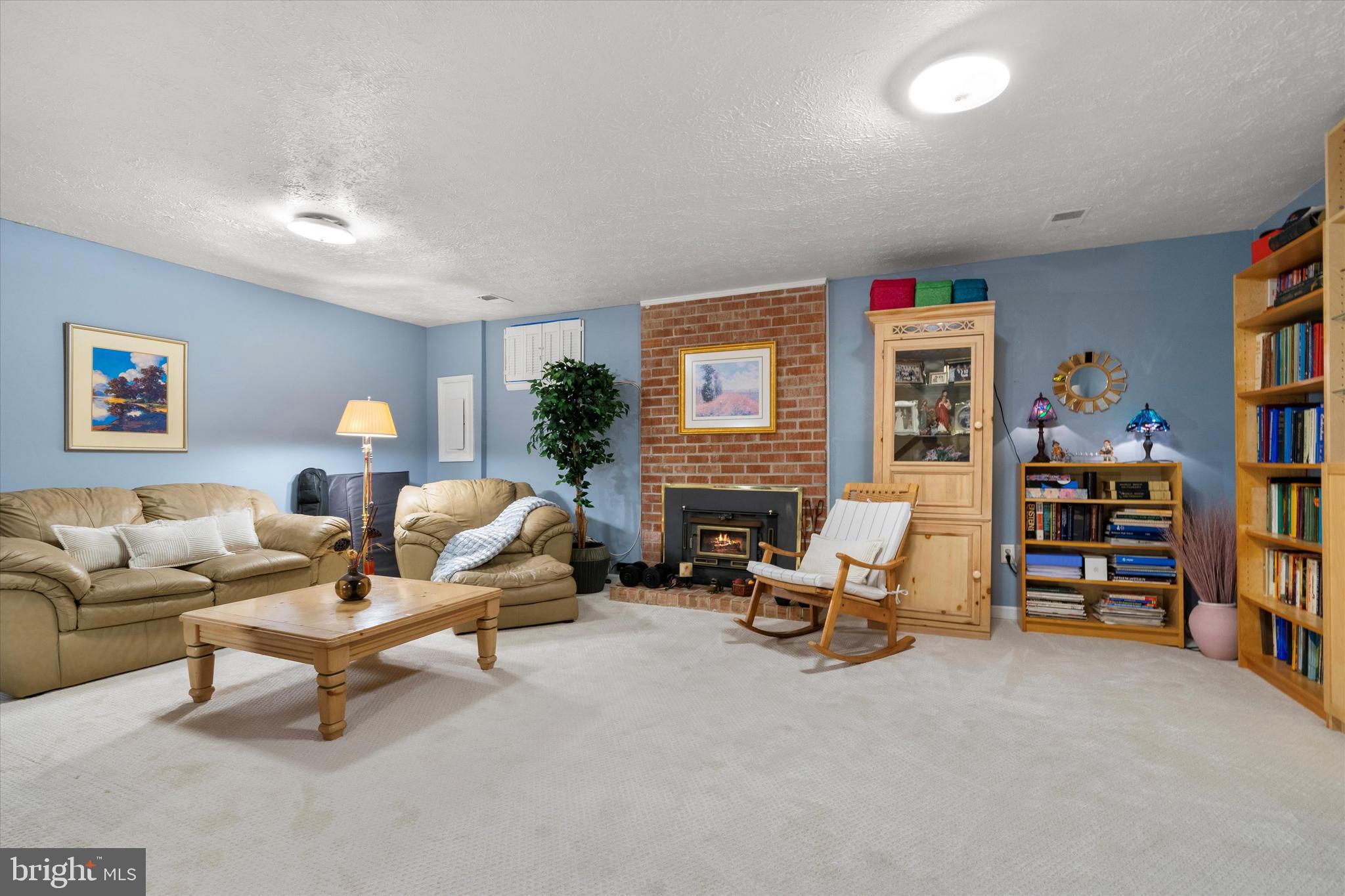 5504 Winford Court Fairfax, VA 22032 - Photo 37 of 61 a living room with furniture and a fireplace