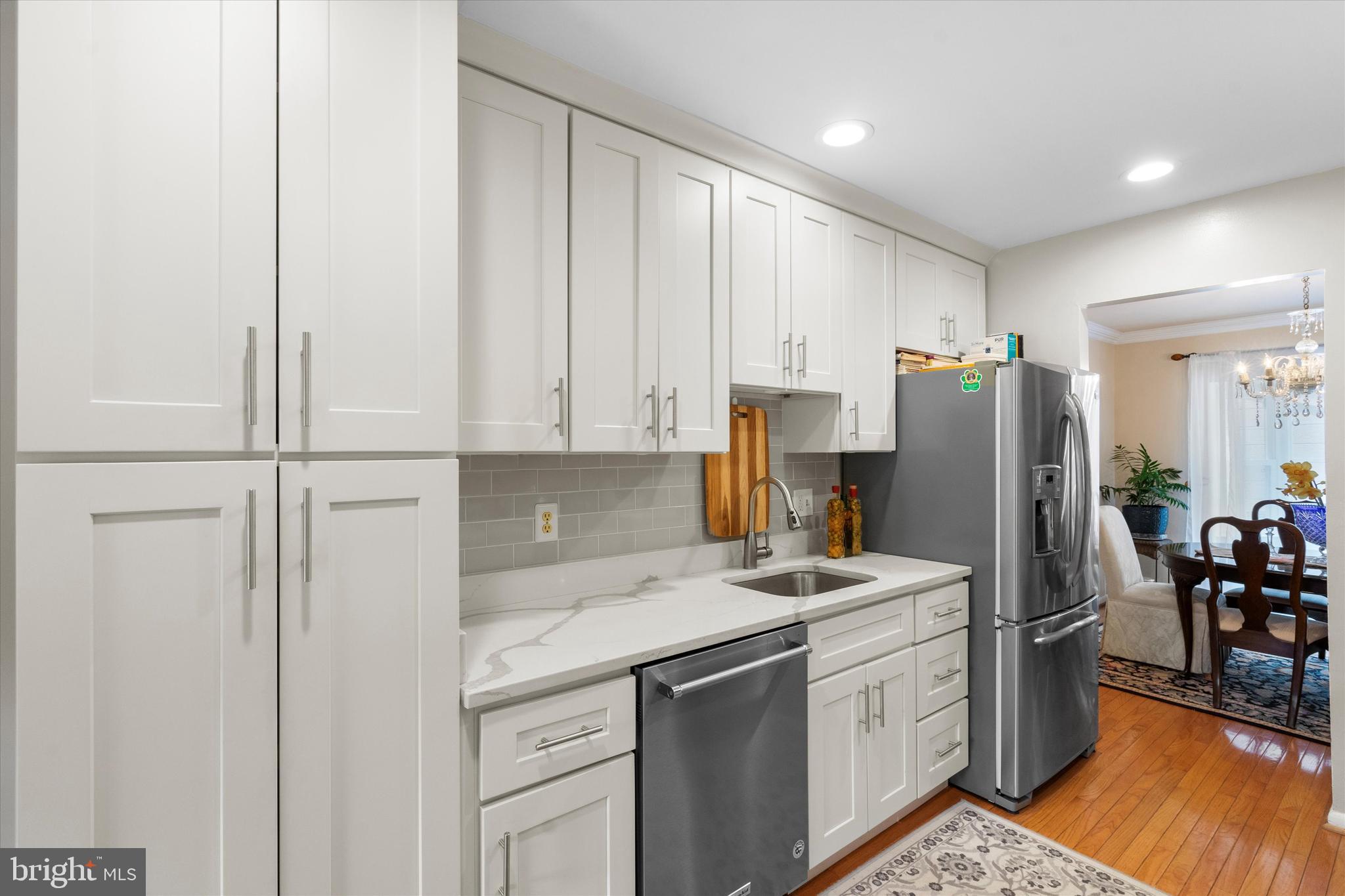 5504 Winford Court Fairfax, VA 22032 - Photo 4 of 61 a kitchen with a refrigerator and countertop