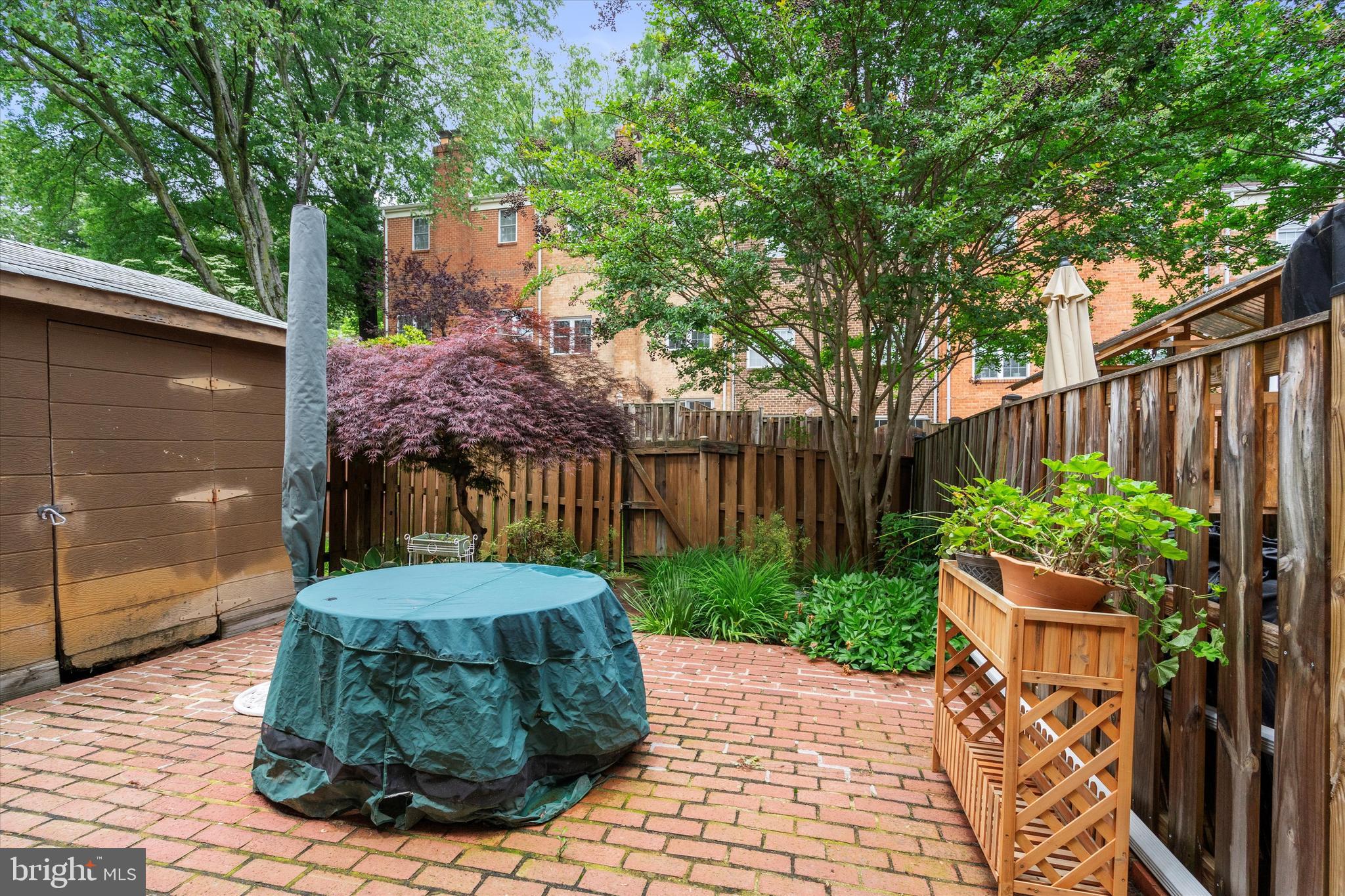 5504 Winford Court Fairfax, VA 22032 - Photo 55 of 61 a view of a backyard with potted plants and large trees