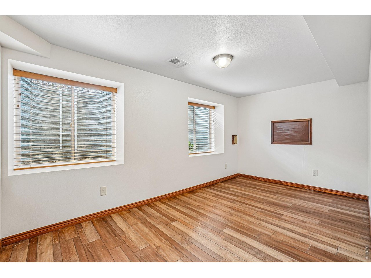 9743 Yellowstone Road Longmont, CO 80504 - Photo 35 of 50 Lower level non-conforming bedroom (no closet)