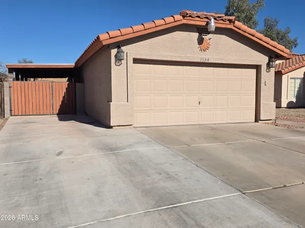 a view of a house with a garage