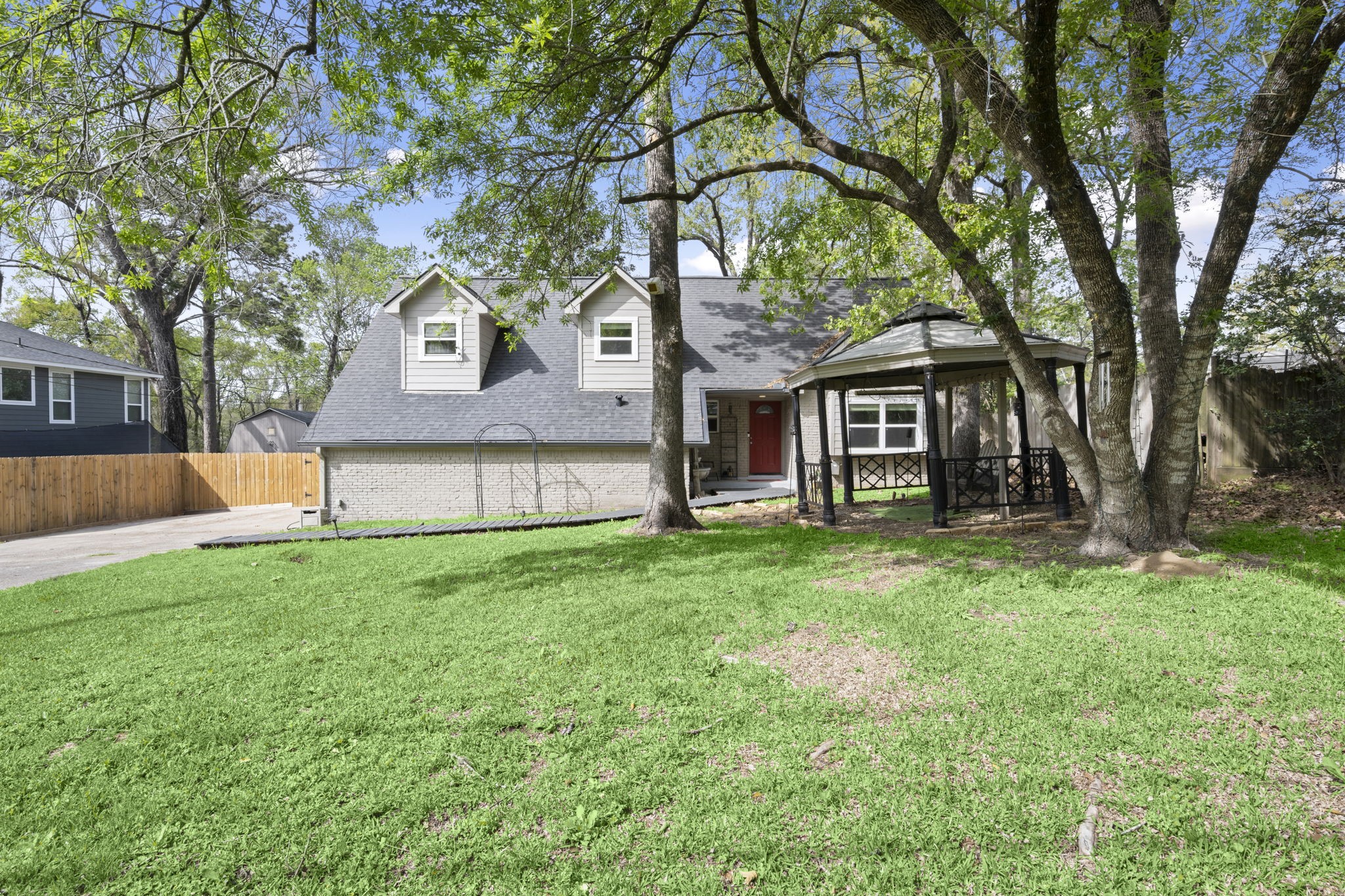 3414 Rustling Pines Street Spring, TX 77380 - Photo 1 of 26 front view of a house with a yard
