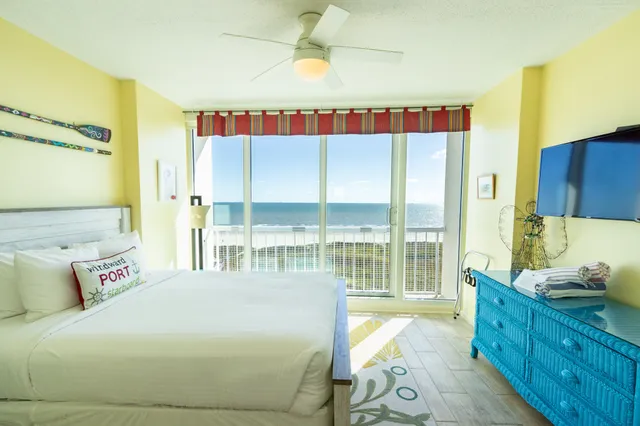 a bedroom with a bed and a cabinets