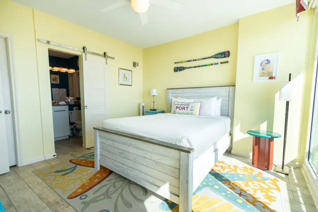 a view of an empty room and glass door