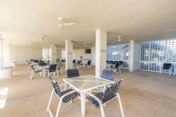 a view of a swimming pool and lounge chair