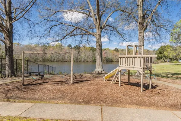 a view of a lake from a yard