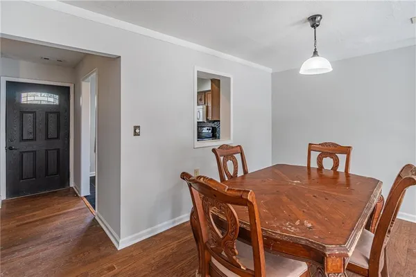 a view of a dining room with furniture