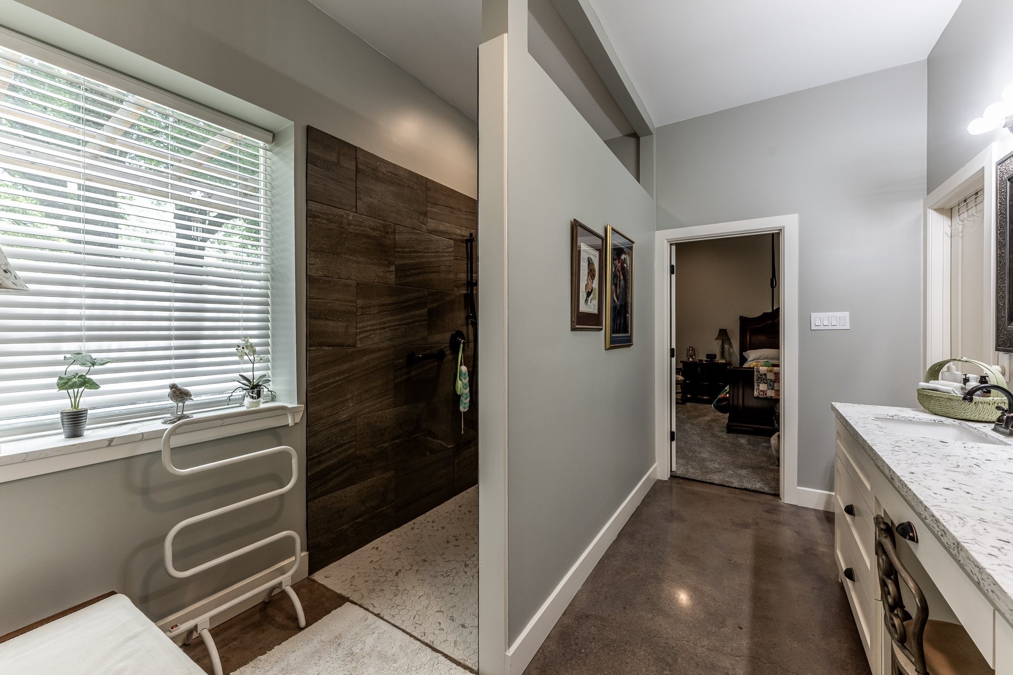 13334 Fultz Road Conroe, TX 77304 - Photo 16 of 49 A spa-worthy walk-in shower, natural light, and polished finishes create a peaceful escape just steps from the bedroom.