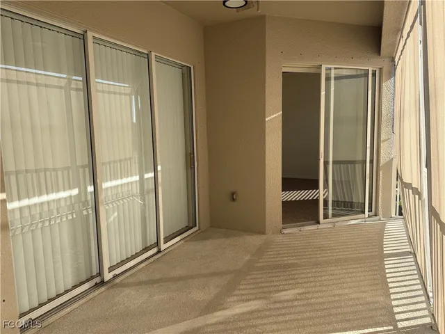 a view of a bathroom with a glass door