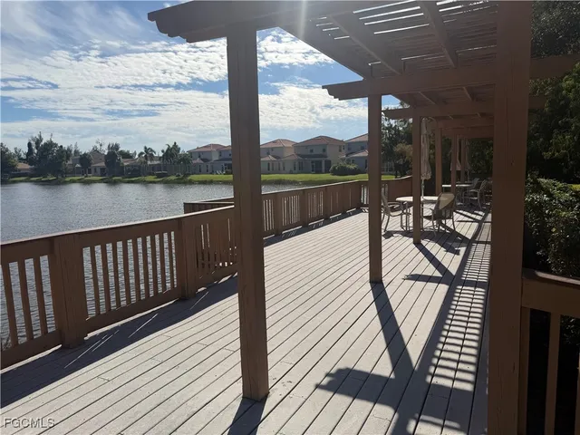 a view of a balcony with wooden floor