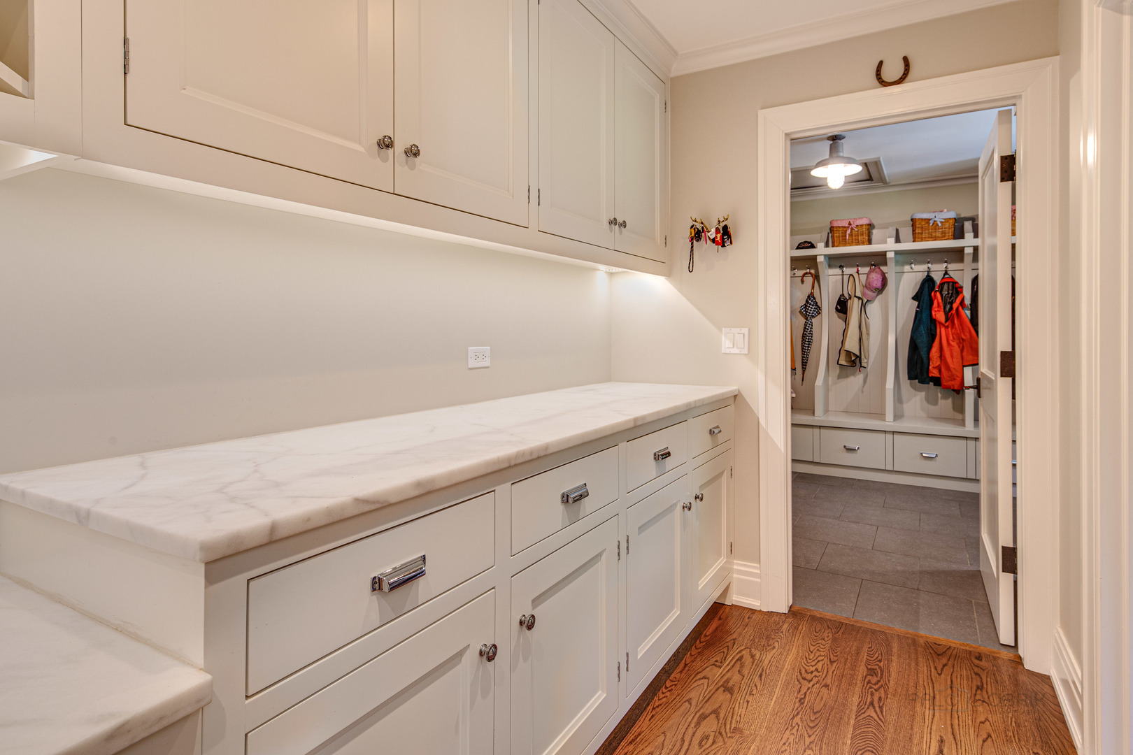 50 Ravine Forest Drive Lake Bluff, IL 60044 - Photo 23 of 44 a kitchen with white cabinets and white appliances