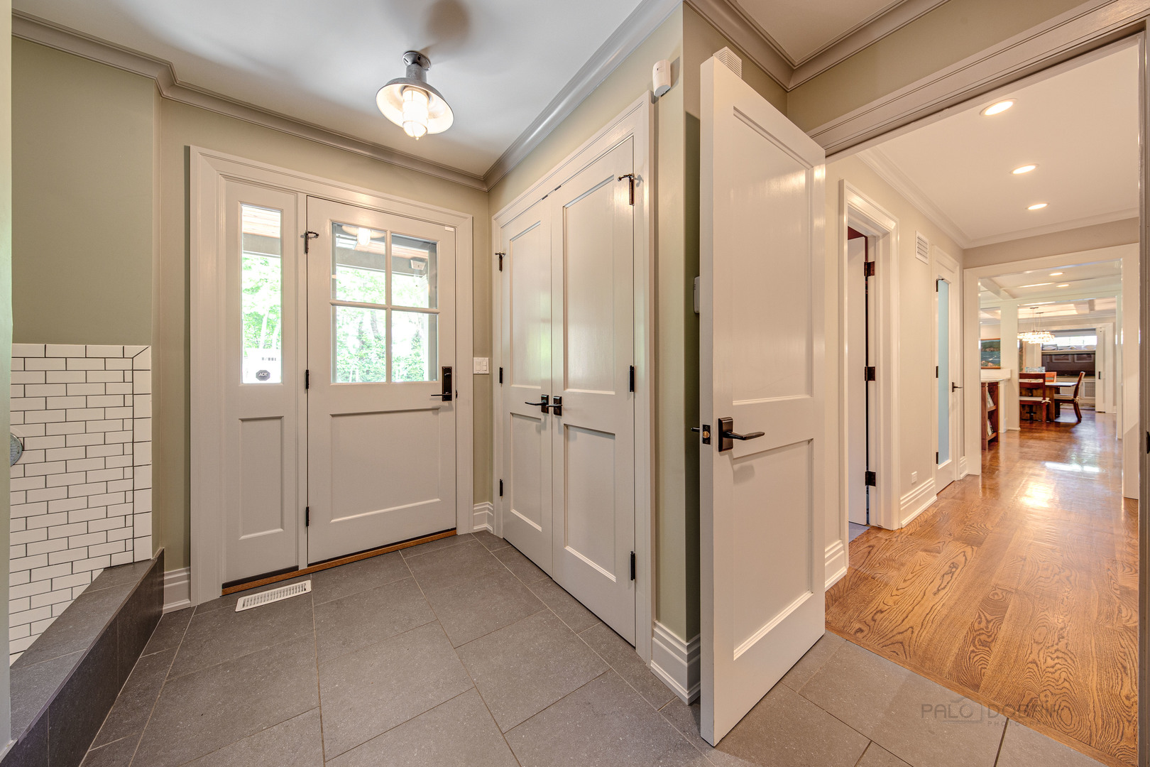 50 Ravine Forest Drive Lake Bluff, IL 60044 - Photo 24 of 44 a view of a hallway with wooden floor and staircase