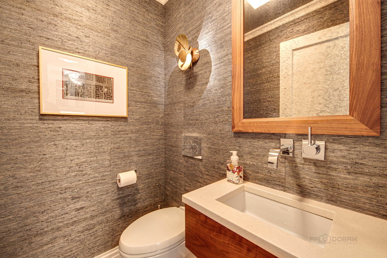 50 Ravine Forest Drive Lake Bluff, IL 60044 - Photo 26 of 44 a bathroom with a sink a toilet and mirror