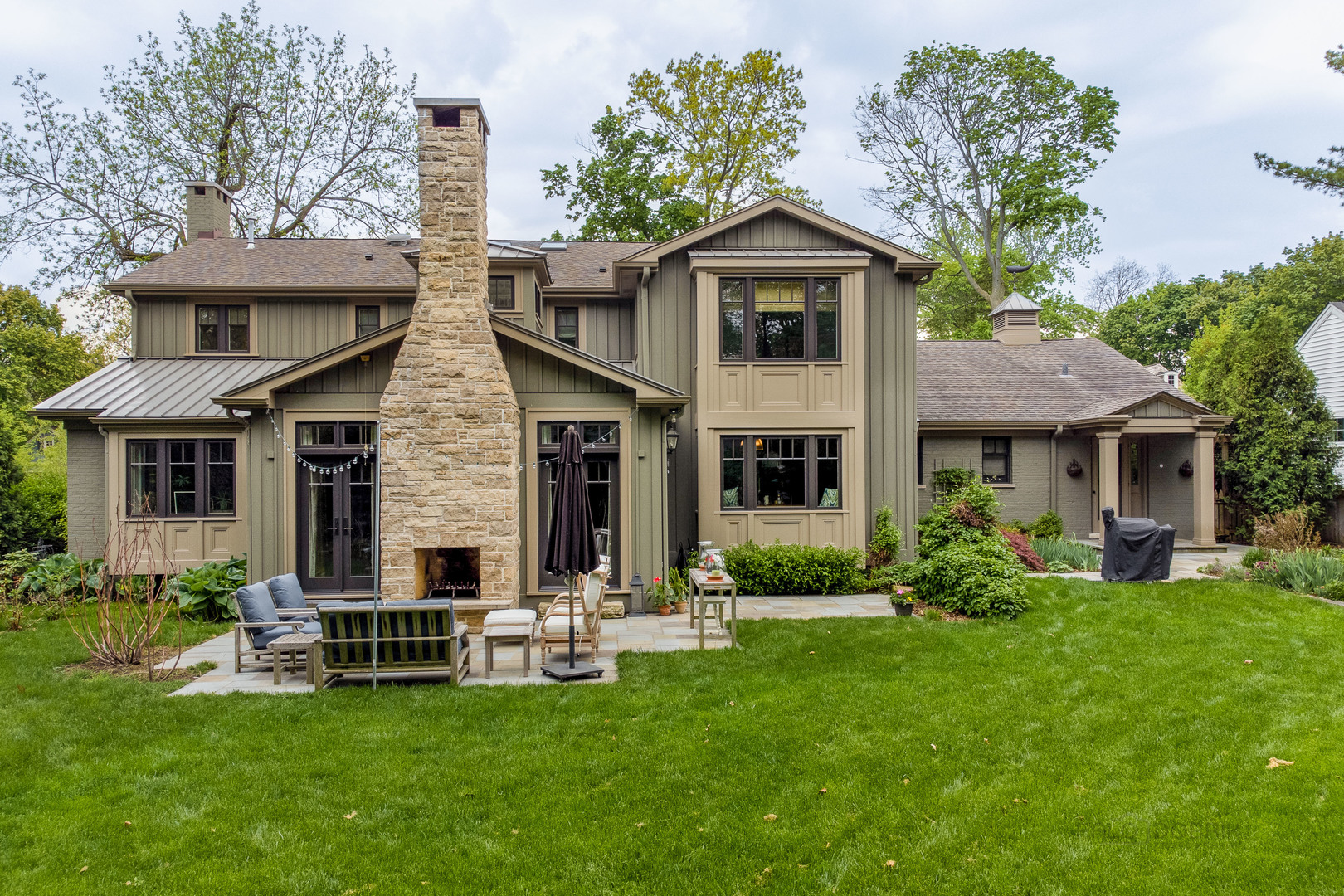 50 Ravine Forest Drive Lake Bluff, IL 60044 - Photo 41 of 44 a view of a house with a yard and lawn chairs