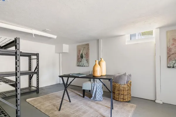 a kitchen with a sink cabinets and window