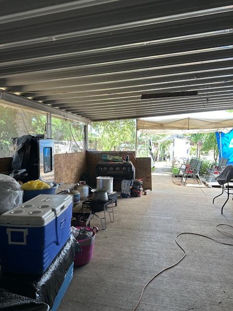 891 Hansen Avenue Merced, CA 95340 - Photo 4 of 6 a living room with furniture and a fireplace