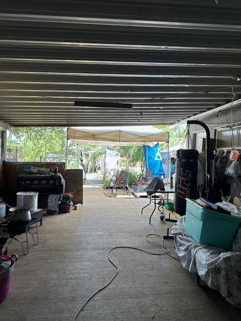 891 Hansen Avenue Merced, CA 95340 - Photo 5 of 6 a view of a chairs and tables in the patio and a grill