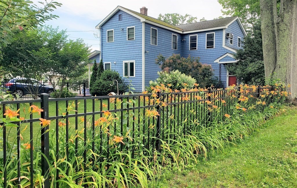 a house view with a garden space