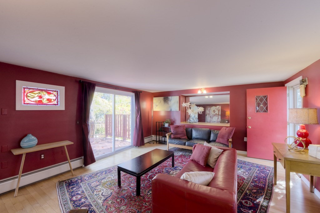 18 Bergin Lane Worcester, MA 01602 - Photo 13 of 42 a living room with furniture a rug and a window