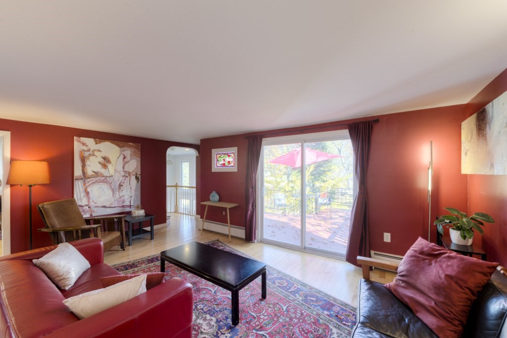 18 Bergin Lane Worcester, MA 01602 - Photo 15 of 42 a living room with furniture and a window