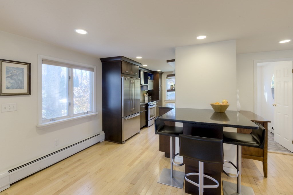 18 Bergin Lane Worcester, MA 01602 - Photo 22 of 42 a view of a dining room with furniture and a window