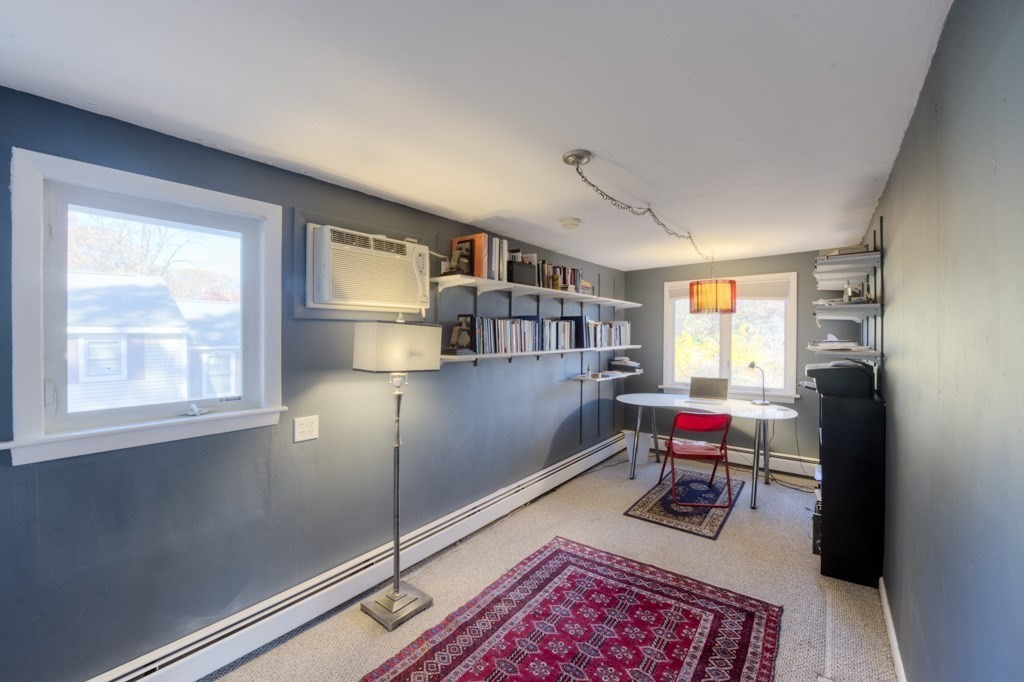 18 Bergin Lane Worcester, MA 01602 - Photo 23 of 42 a workspace with furniture and a window