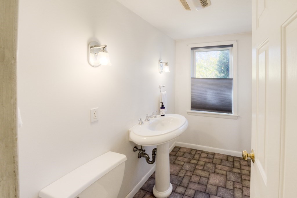 18 Bergin Lane Worcester, MA 01602 - Photo 26 of 42 a bathroom with a sink toilet and shower