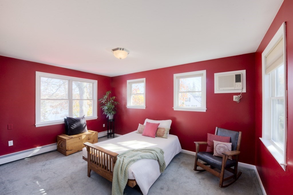 18 Bergin Lane Worcester, MA 01602 - Photo 30 of 42 a bedroom with a bed chair and window