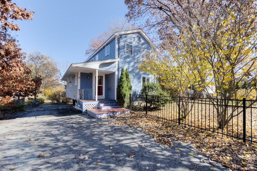18 Bergin Lane Worcester, MA 01602 - Photo 3 of 42 a front view of a house with a yard