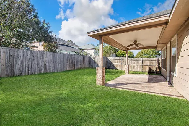 a view of a backyard with a slide