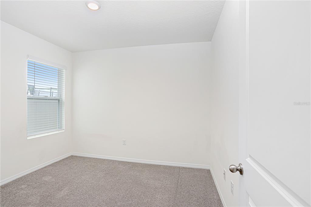 31210 Penny Surf Loop Wesley Chapel, FL 33545 - Photo 14 of 39 a view of an empty room