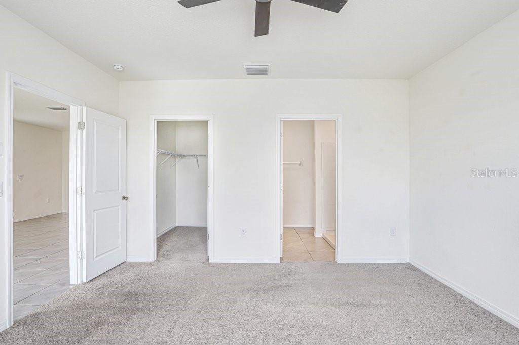 31210 Penny Surf Loop Wesley Chapel, FL 33545 - Photo 16 of 39 an empty room with windows