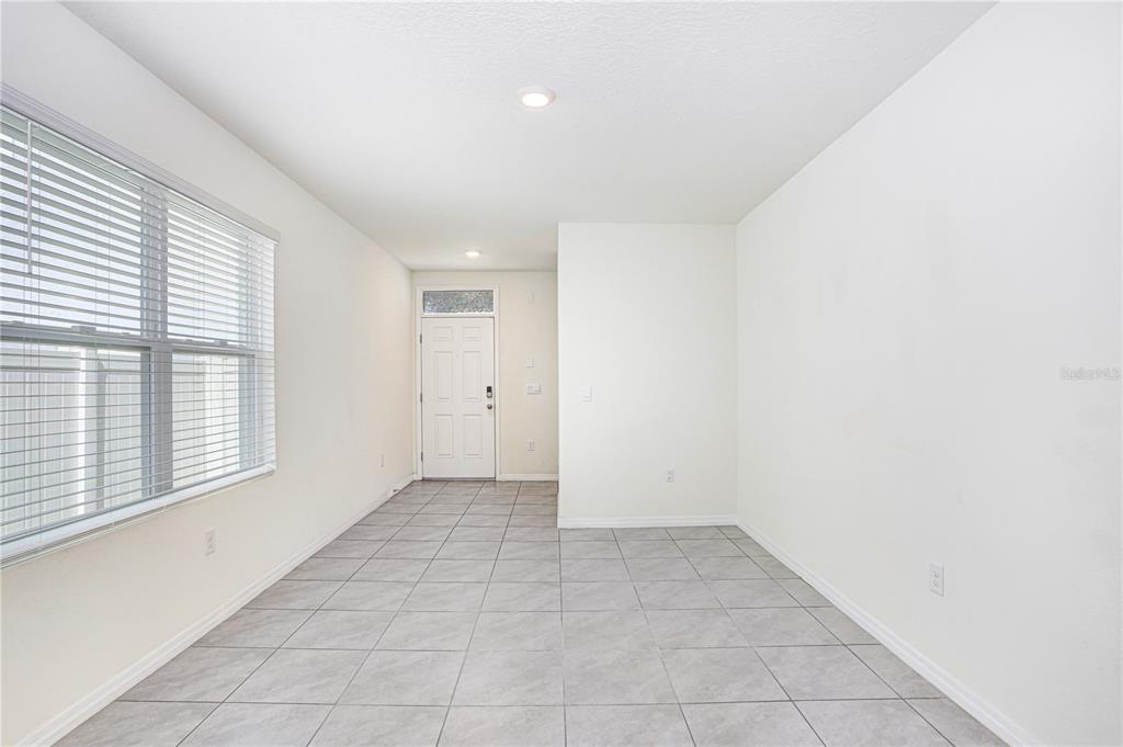 31210 Penny Surf Loop Wesley Chapel, FL 33545 - Photo 5 of 39 an empty room with windows