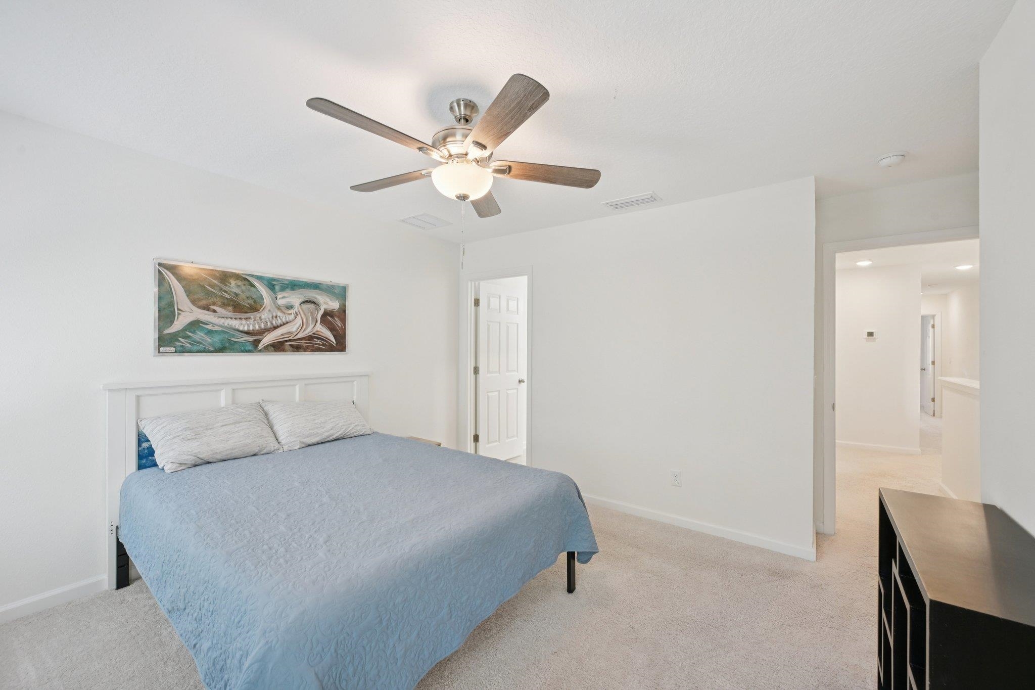 22 Ridge Lake Road St. Augustine, FL 32086 - Photo 13 of 31 Bedroom with light colored carpet and ceiling fan
