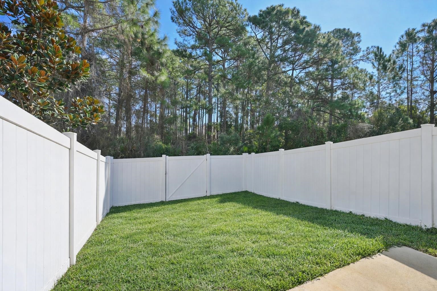 22 Ridge Lake Road St. Augustine, FL 32086 - Photo 16 of 31 Fenced backyard featuring a gate