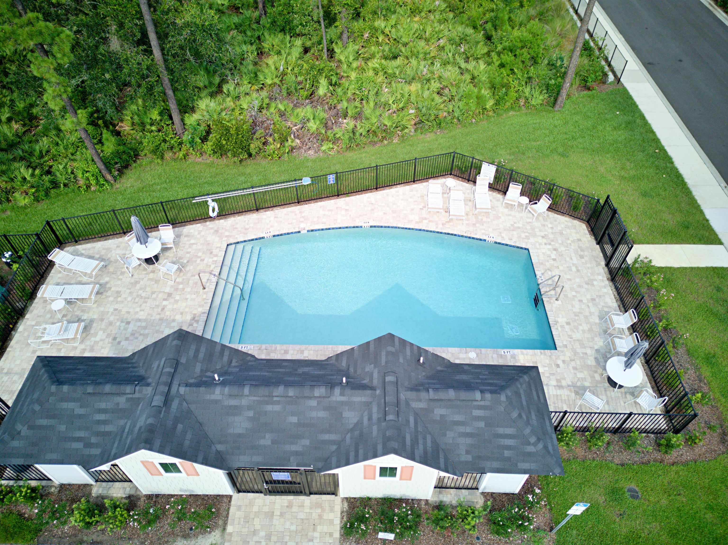 22 Ridge Lake Road St. Augustine, FL 32086 - Photo 21 of 31 Community pool featuring a patio