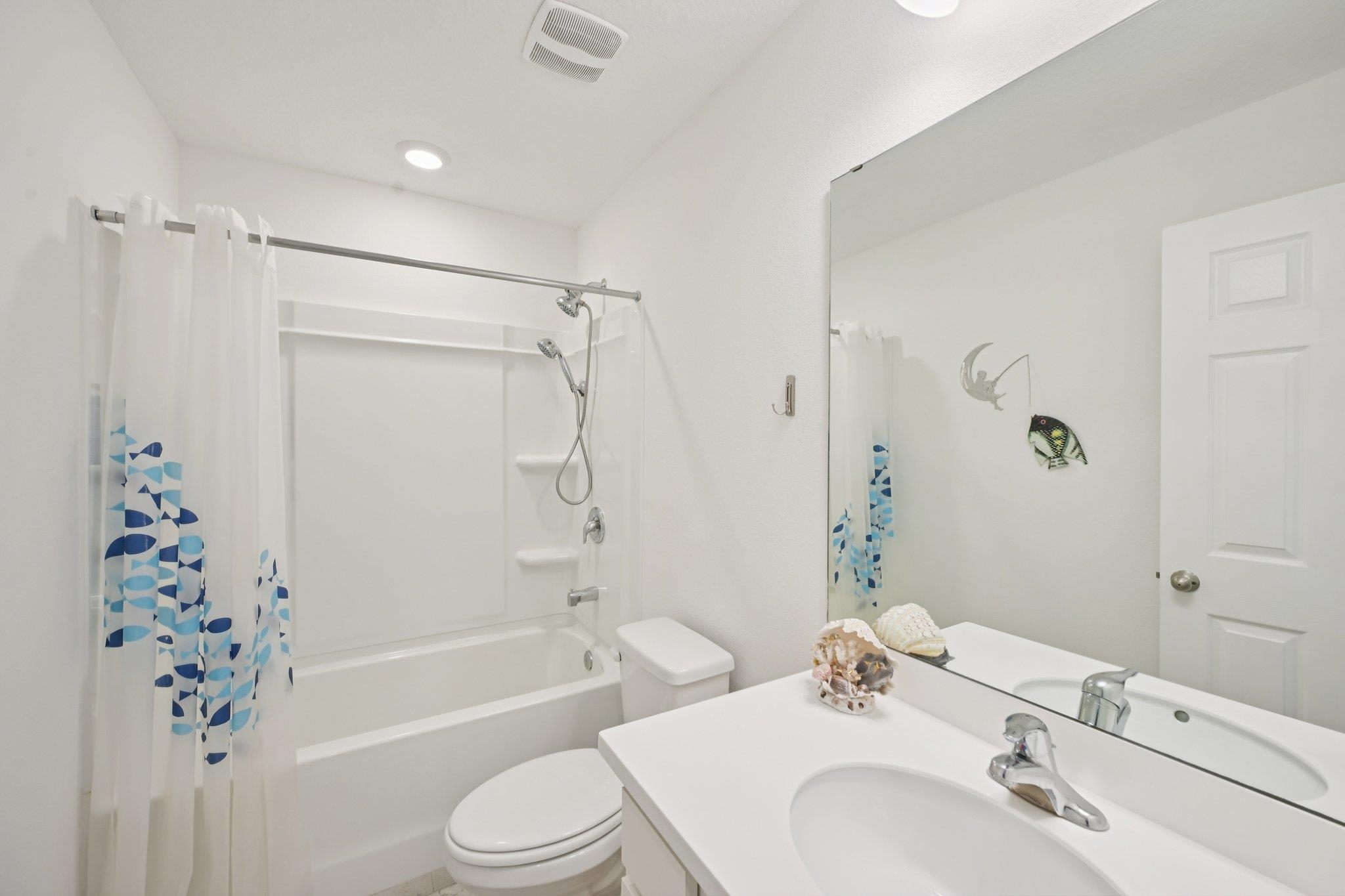 22 Ridge Lake Road St. Augustine, FL 32086 - Photo 22 of 31 a bathroom with a sink toilet tub and shower